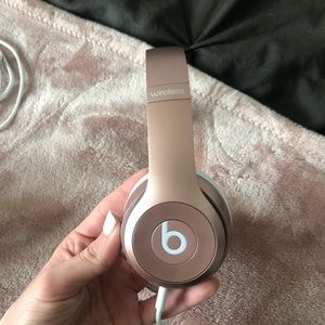 Rose gold Beats headphones